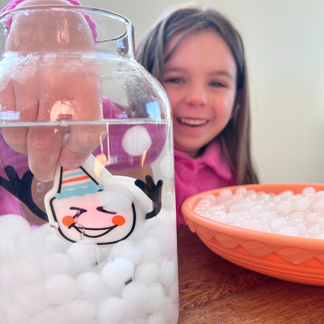 Girl with Glo Pals Character and Water Beads